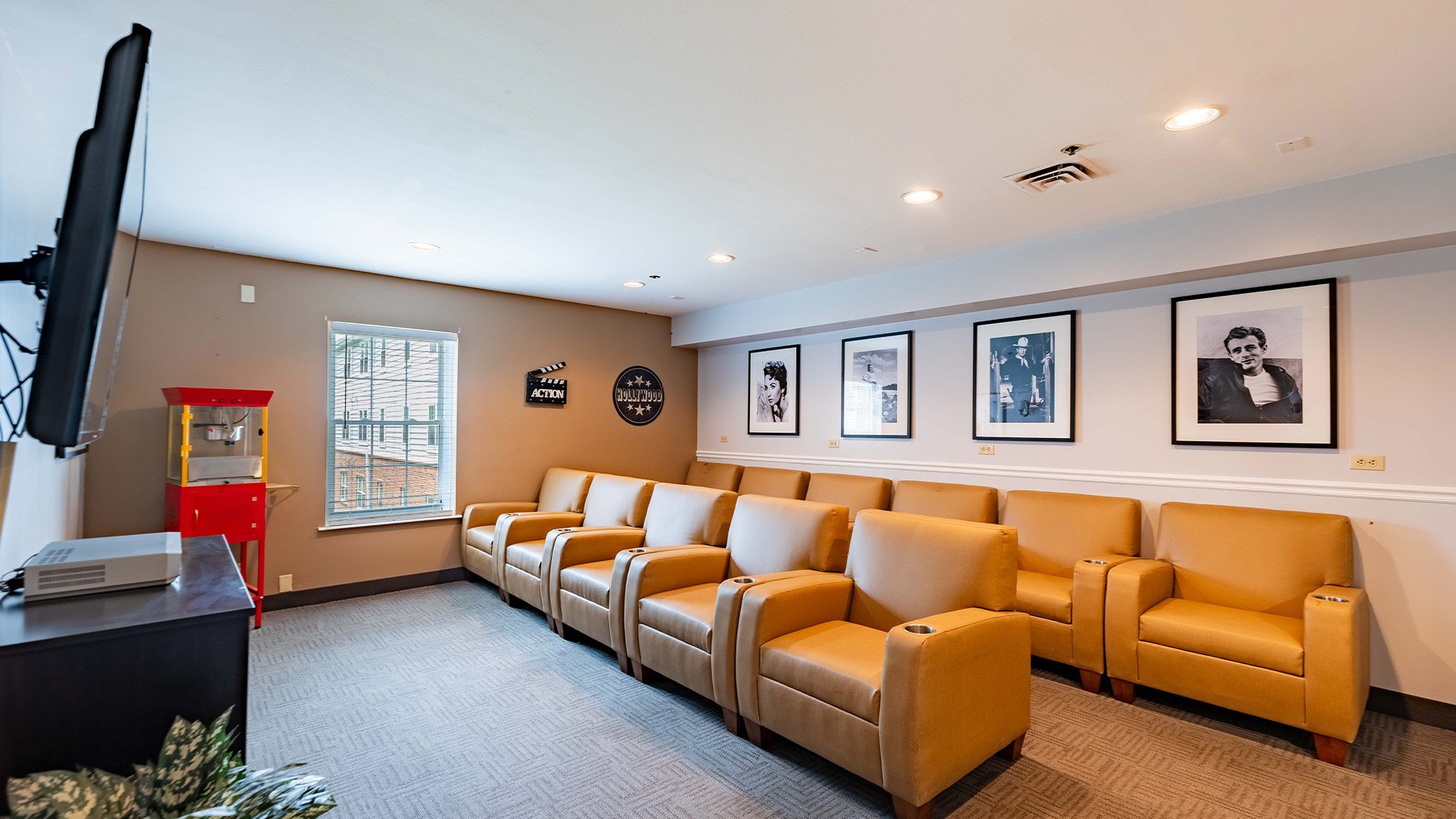 The comfortable and accessible movie theater at Cedarhurst of Tesson Heights, providing easy-to-access entertainment for residents