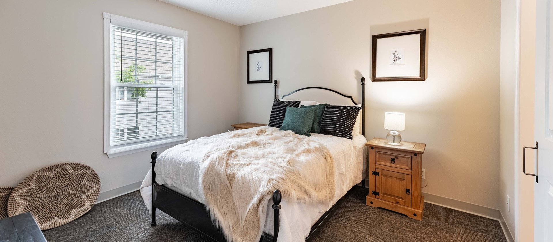 Bedroom of a senior apartment at Cedarhurst of Tesson Heights, designed for resident comfort and personalization