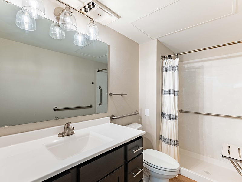 Bathroom of a senior apartment at Cedarhurst of Tesson Heights, built with accessibility features to support residents