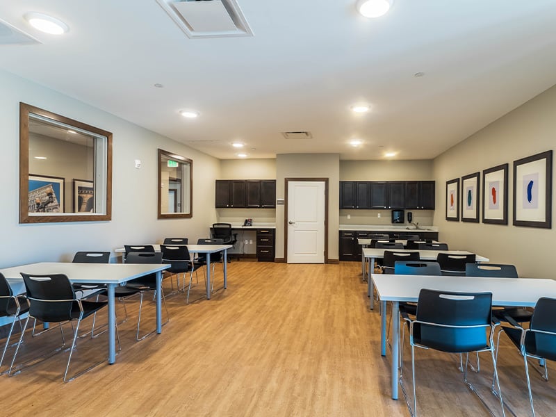 Residents at Cedarhurst of Topeka enjoy a dedicated art and activity room, offering an accessible space for hobbies, crafts, and games