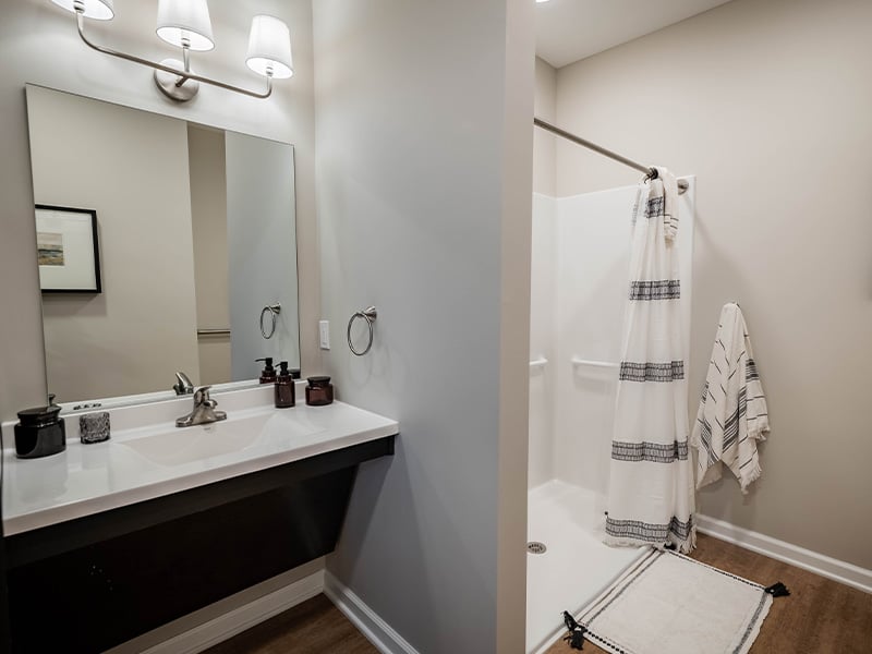 Bathroom of a senior apartment at Cedarhurst of Topeka, built with accessibility features to support residents