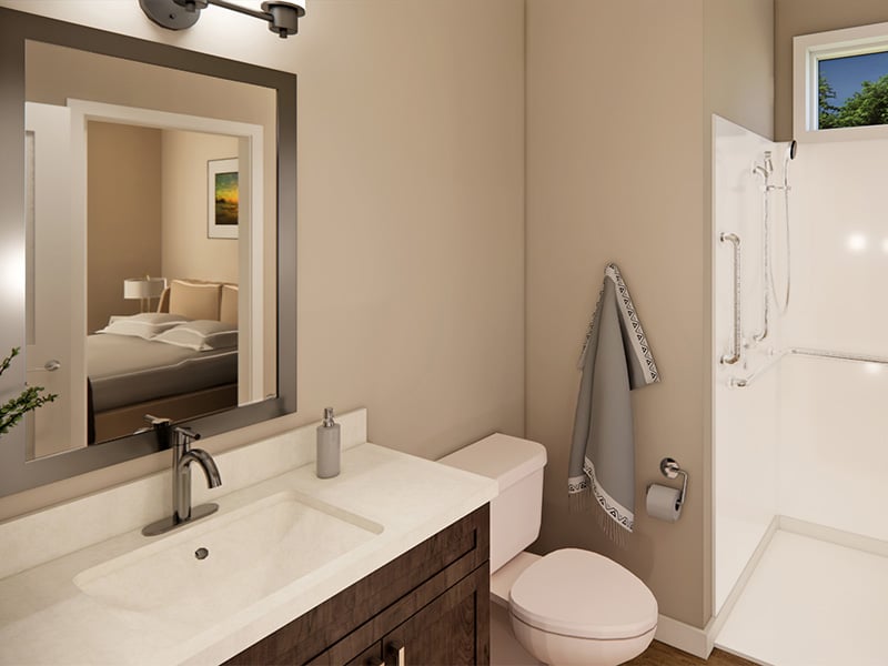 Bathroom at Cedarhurst of Topeka's Independent Living at Cedarhurst Cottages, featuring walk-in shower with grab bars