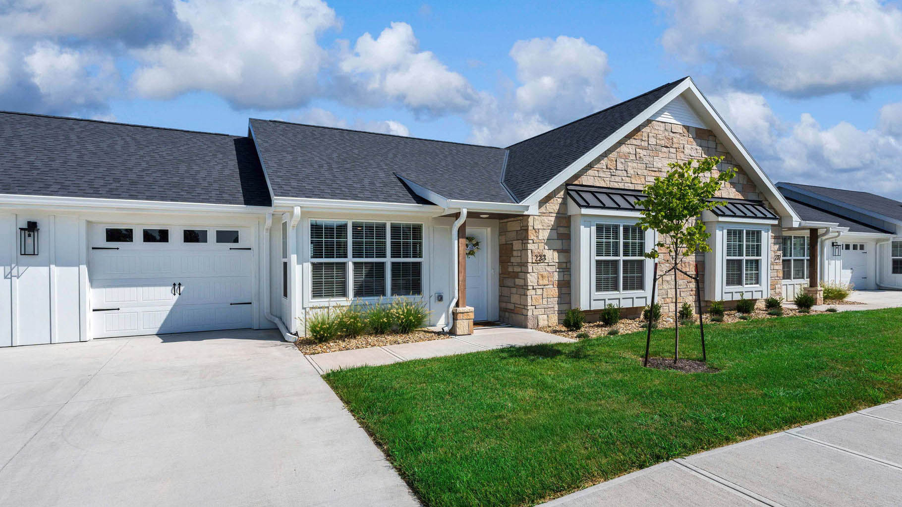 An exterior of a cottage unit at Cedarhurst of Topeka's Independent Living at Cedarhurst Cottages