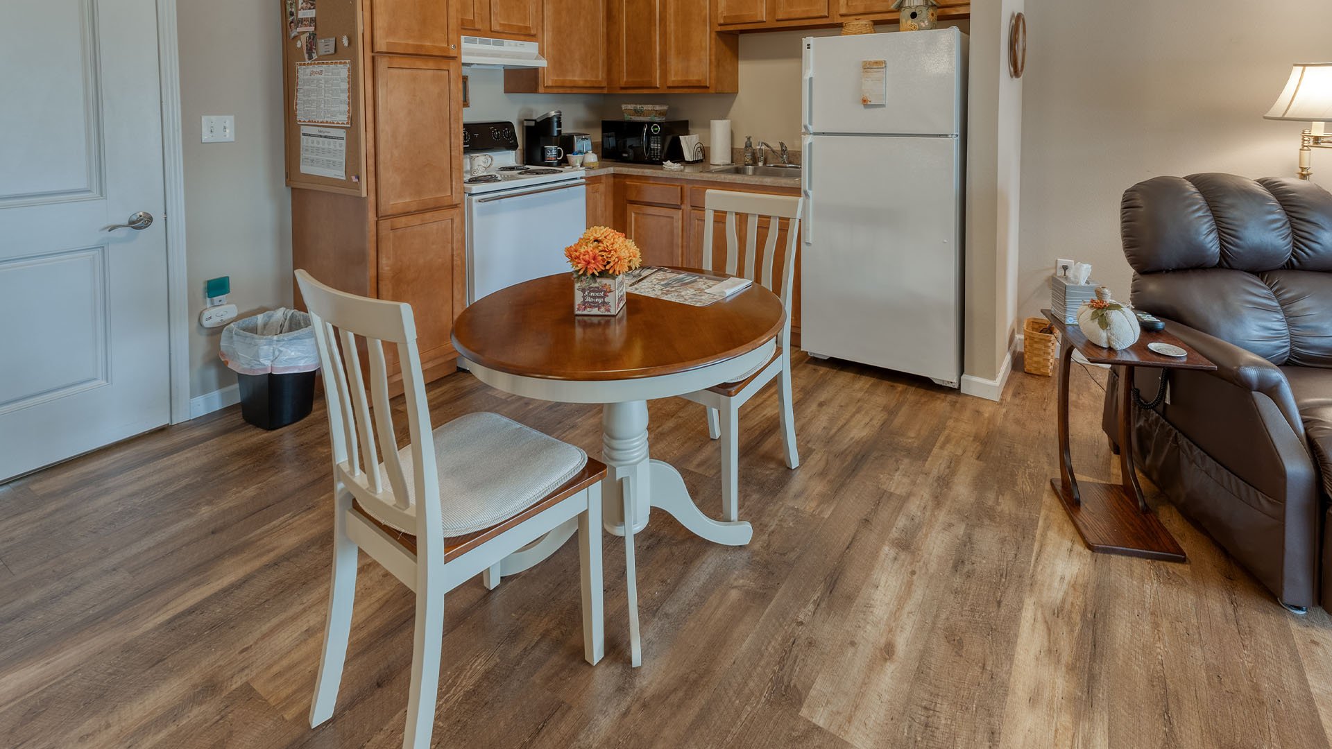 An accessible kitchenette in a senior apartment at Cedarhurst of Waterloo, designed for ease of use and independence