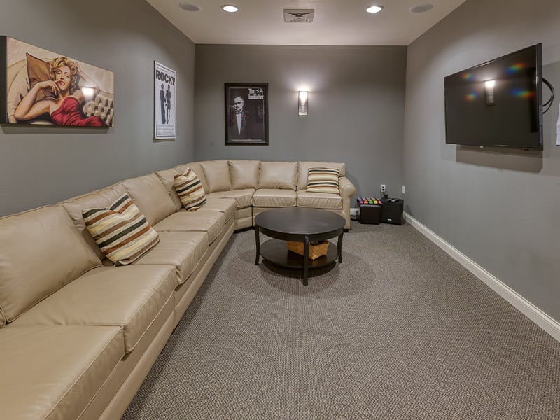 The comfortable and accessible movie theater at Cedarhurst of Waterloo, providing easy-to-access entertainment for residents
