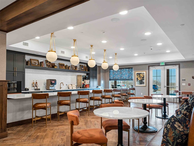 The inviting on-site bistro and coffee bar at Cedarhurst of Wentzville, offering a senior-friendly spot for coffee and socializing for residents