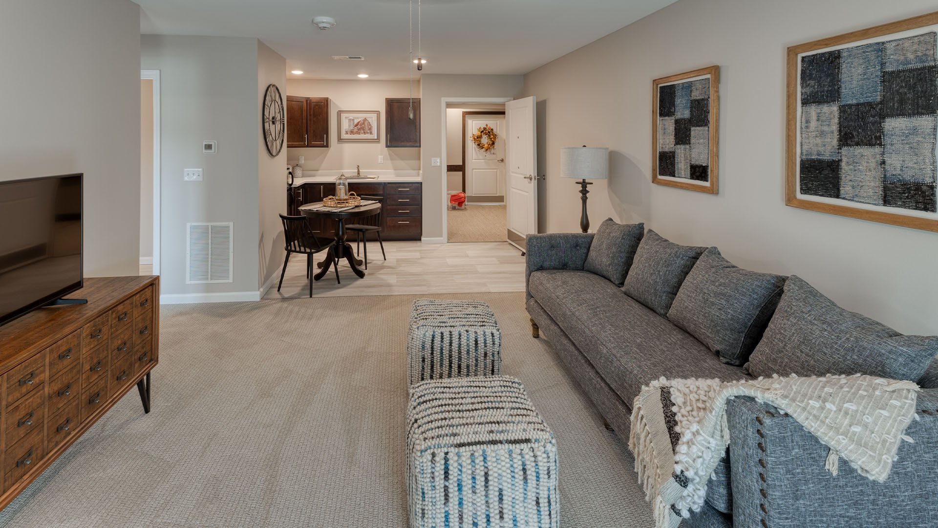 Senior-friendly apartment living room at Cedarhurst of West Plains, offering comfortable and accessible design for residents.