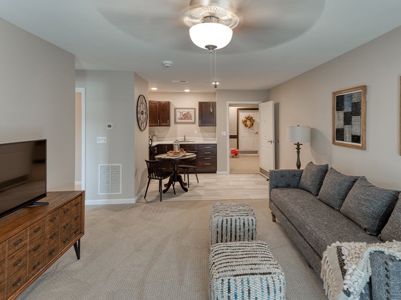 Senior-friendly apartment living room at Cedarhurst of West Plains, offering comfortable and accessible design for residents.