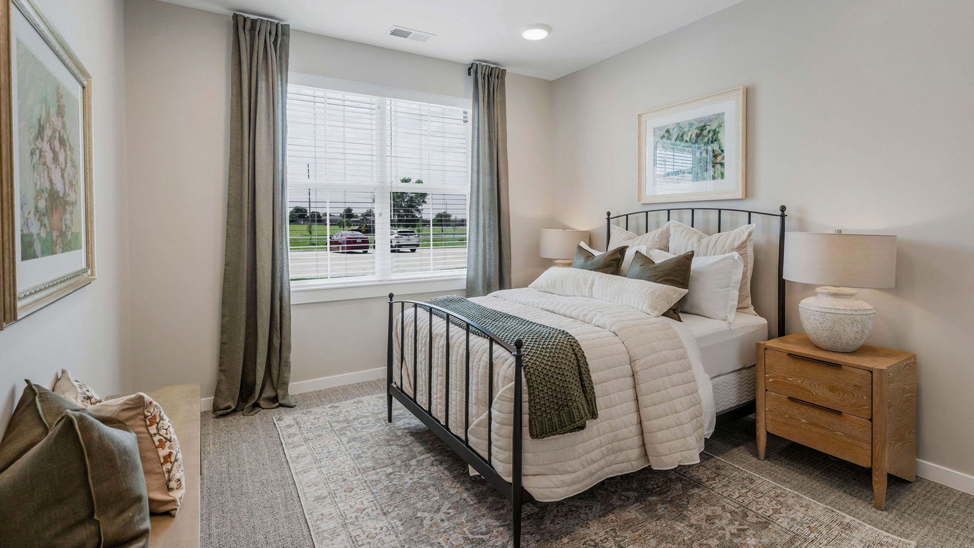 Bedroom of a senior apartment at Cedarhurst of Wichita, designed for resident comfort and personalization