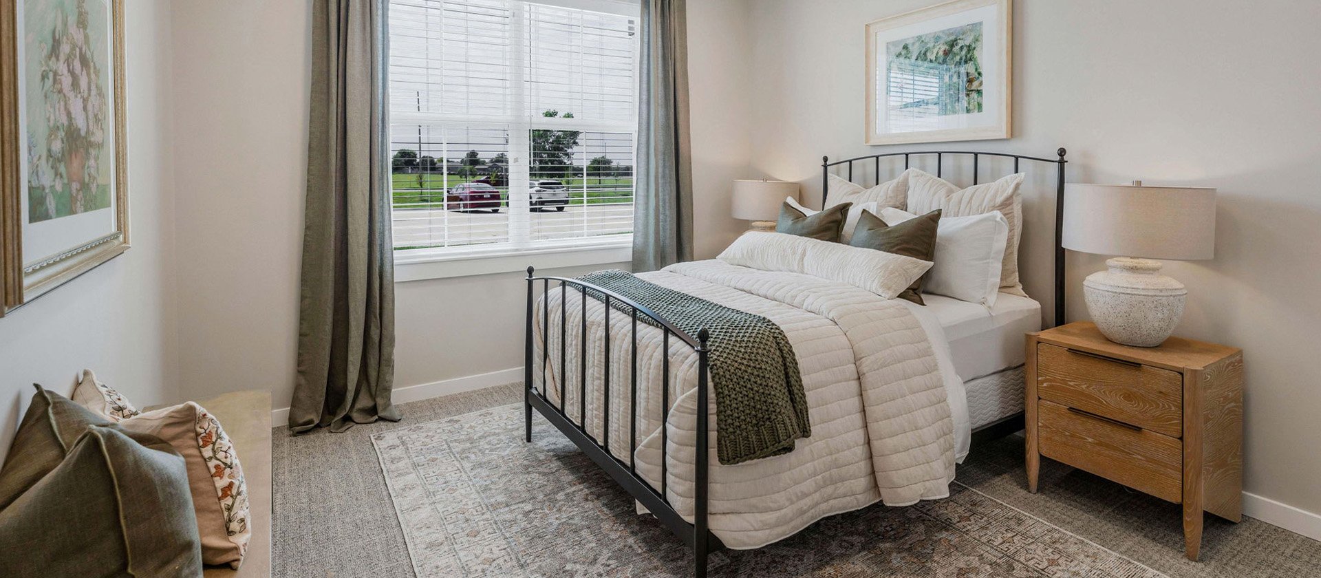 Bedroom of a senior apartment at Cedarhurst of Wichita, designed for resident comfort and personalization