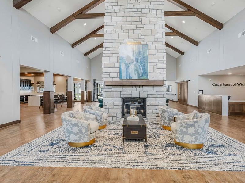 The bright and accessible main lobby at Cedarhurst of  Wichita, offering a warm first impression to the senior living community.
