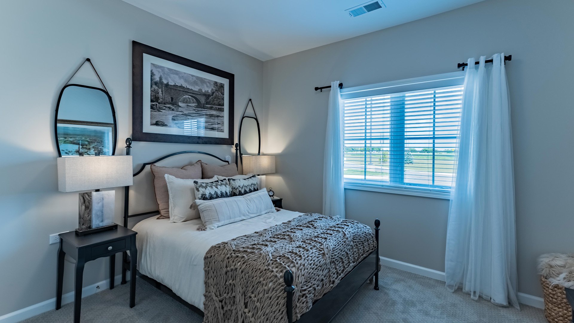Bedroom of a senior apartment at Cedarhurst of Woodstock, designed for resident comfort and personalization