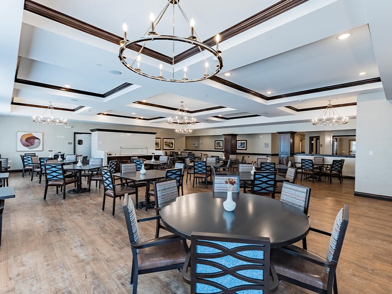 A community dining room at Cedarhurst of Woodstock, providing convenient all-day dining for residents