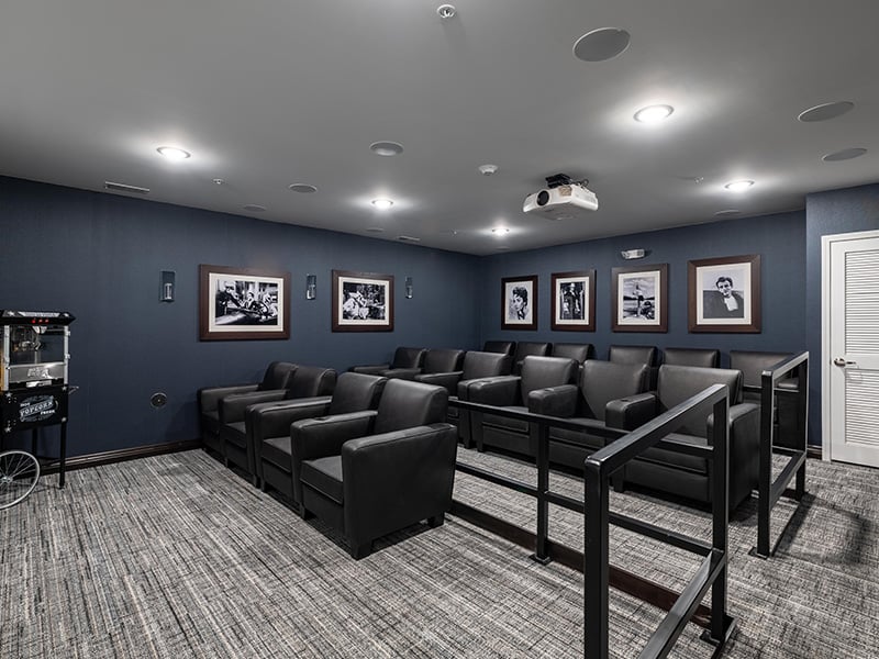 The comfortable and accessible movie theater at Cedarhurst of Woodstock, providing easy-to-access entertainment for residents