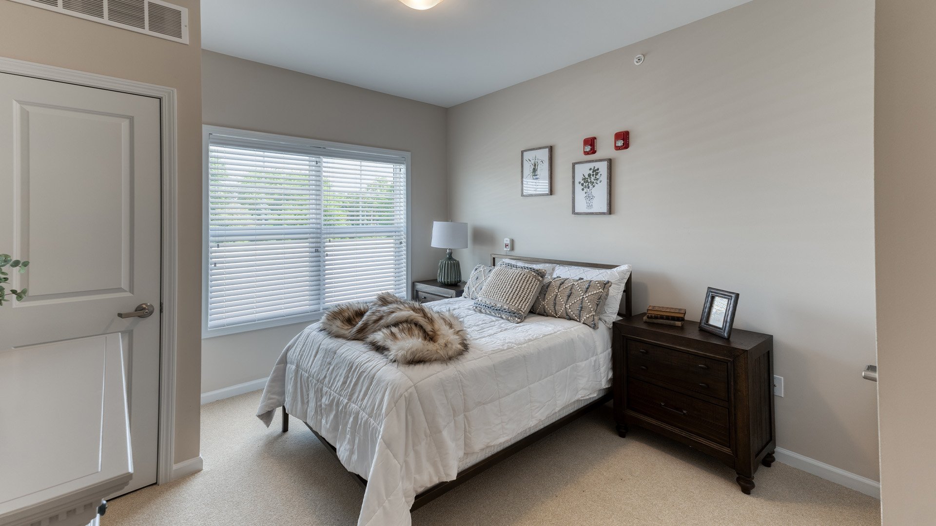 Bedroom of a senior apartment at Cedarhurst of Yorkville, designed for resident comfort and personalization