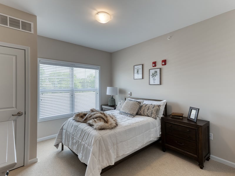 Bedroom of a senior apartment at Cedarhurst of Yorkville, designed for resident comfort and personalization