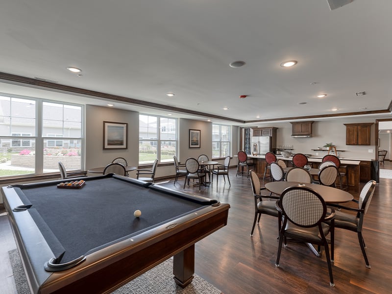 Senior residents can enjoy a well-equipped game room at Cedarhurst of Yorkville - including a pool table.