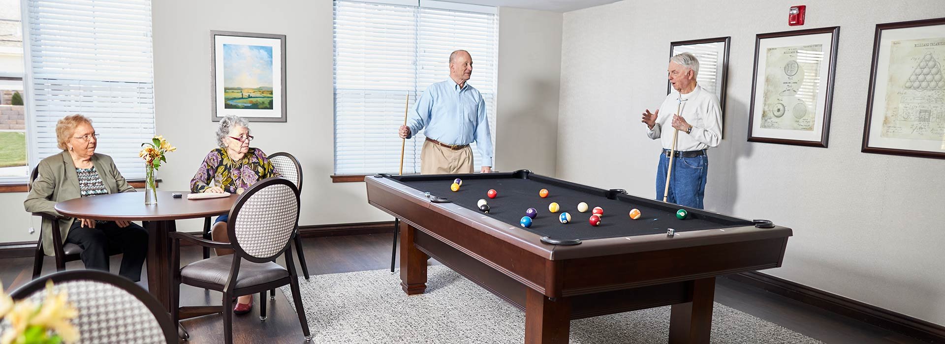 seniors at pool table