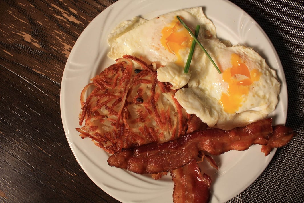 Crafted by Cedarhurst bacon, eggs, and hash browns