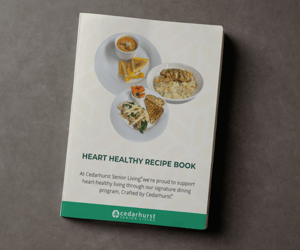 A booklet with three meals on the cover. The title reads 'Heart Healthy Recipes.'
