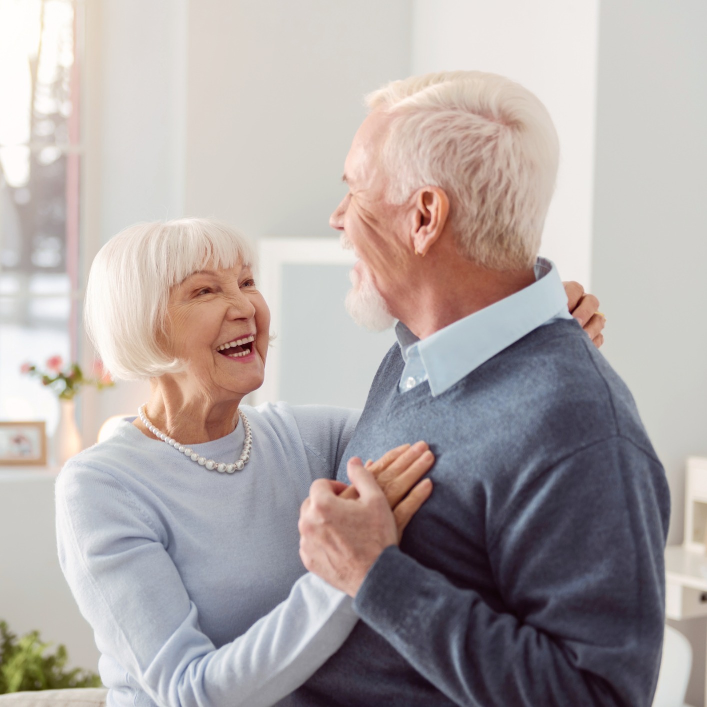 a senior couple dancing