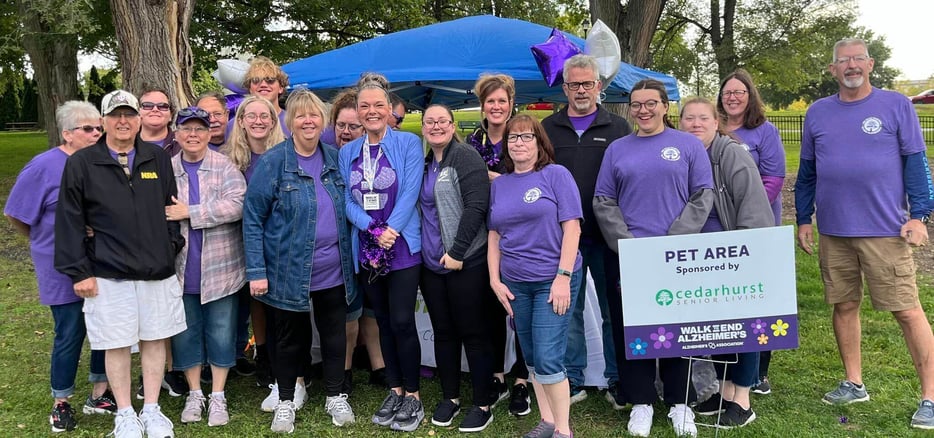 Senior living residents grouped for a walk to end alzheimer's photo.