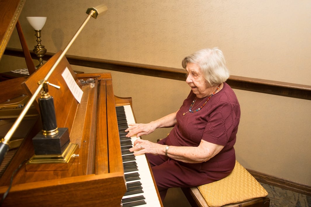 Resident playing piano