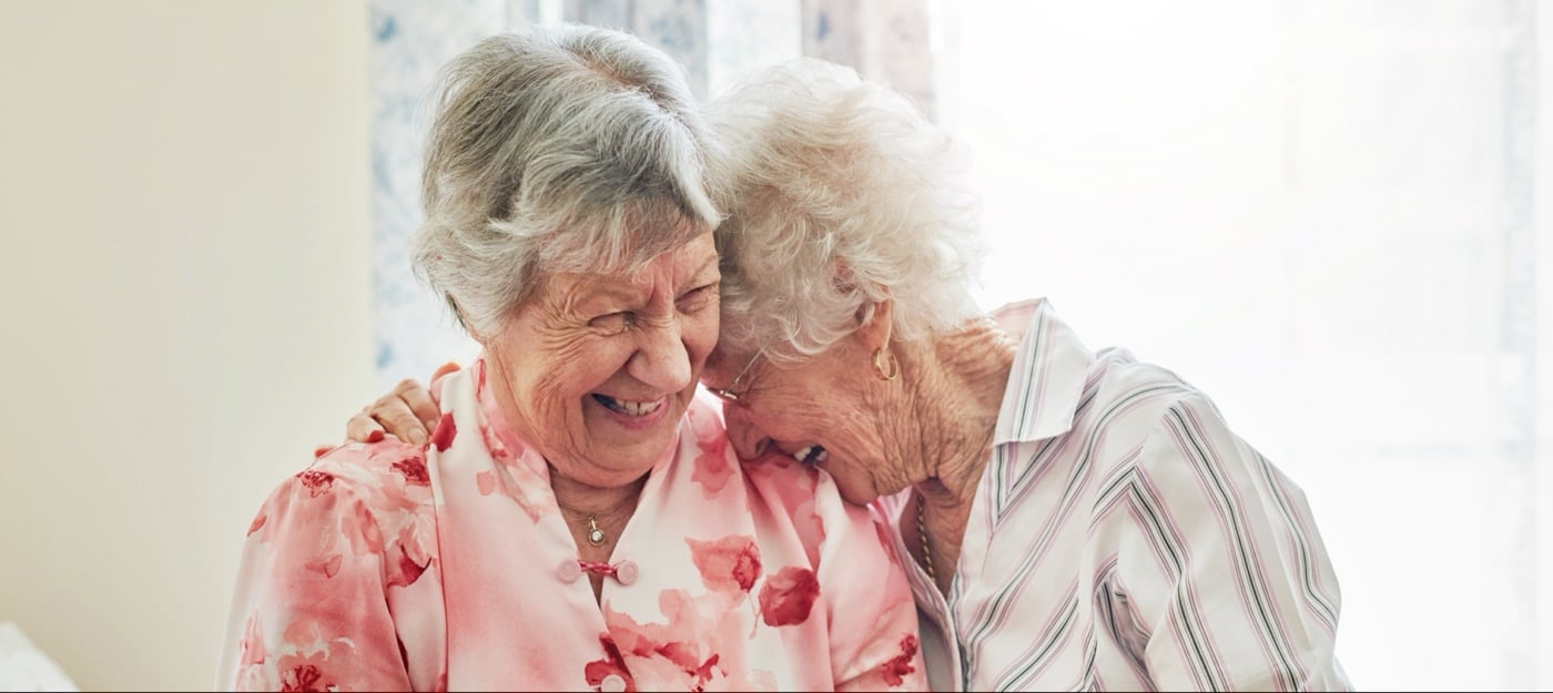 Two seniors laughing together Two seniors laughing together