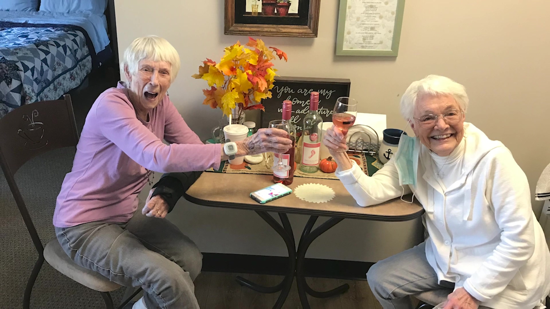 Shirley and friend with wine