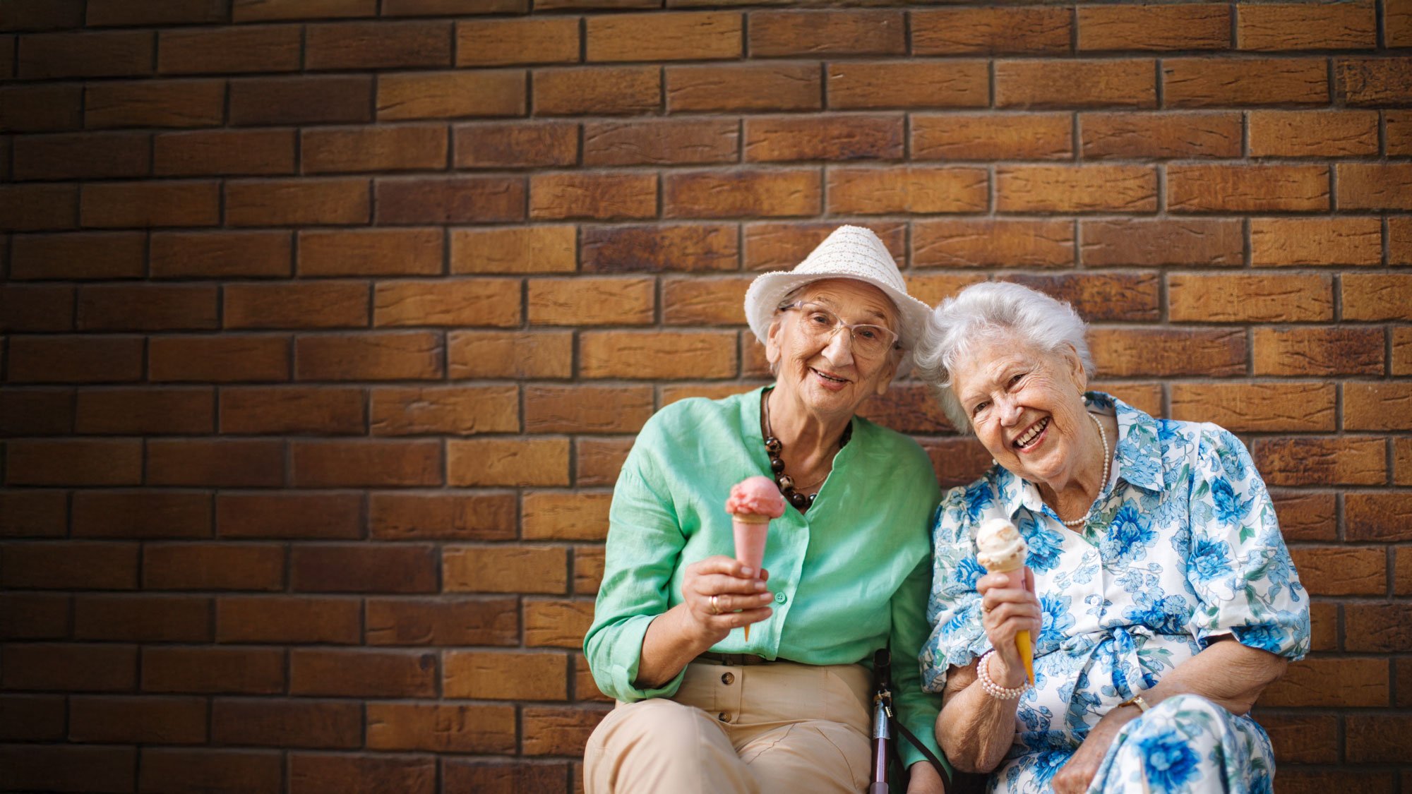 senior friends eating ice cream together