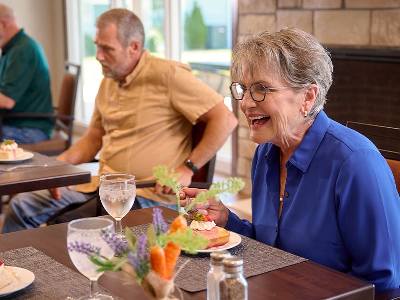 Senior woman enjoying dinner