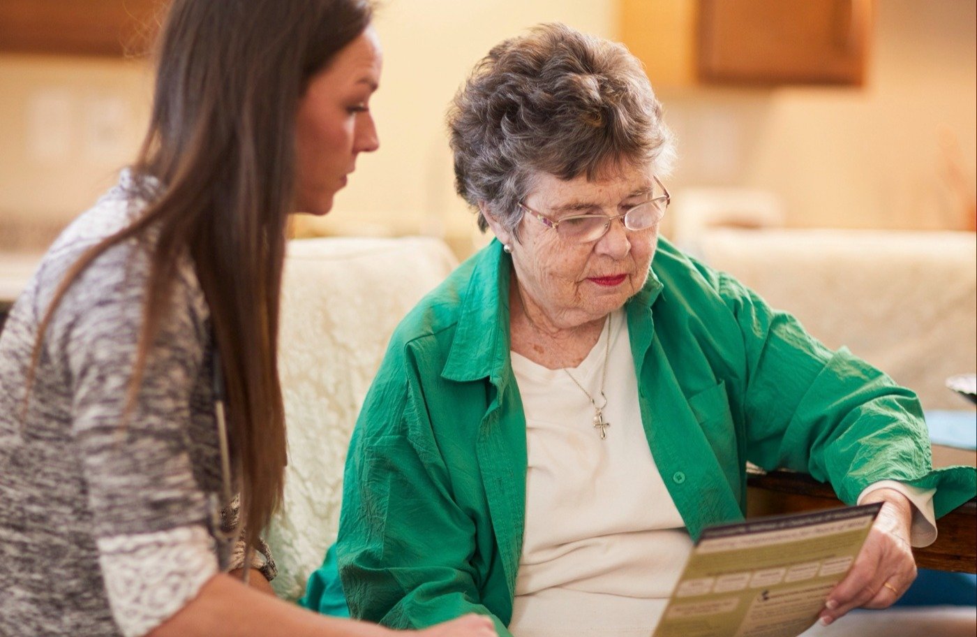 A team member reading with a senior resident=