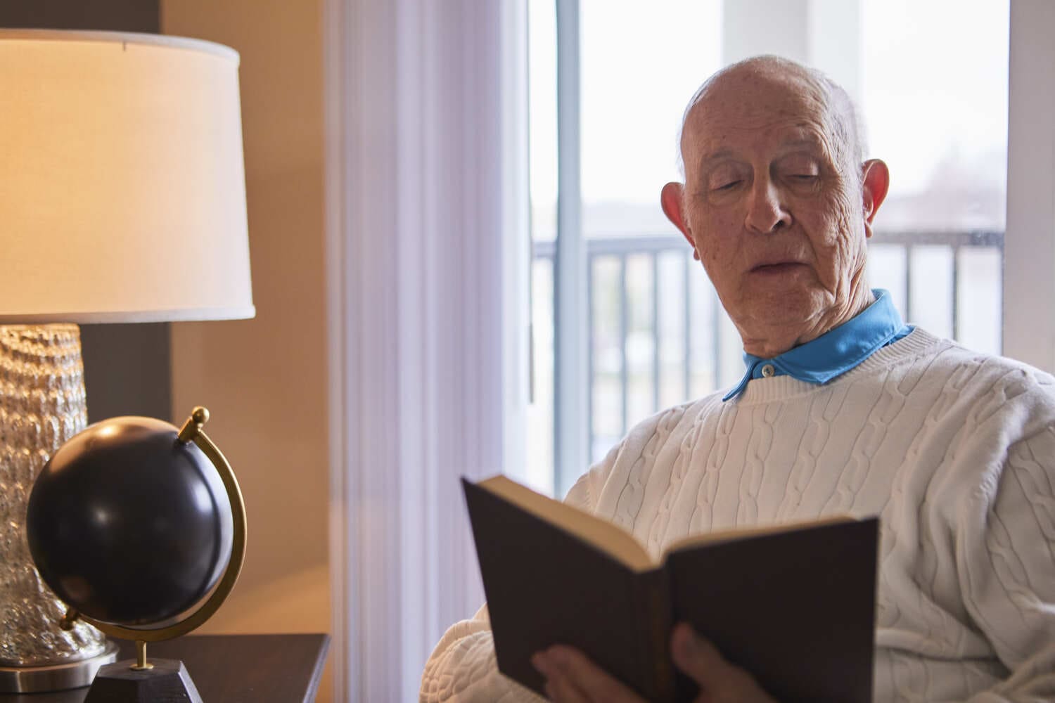 Senior man reading a book