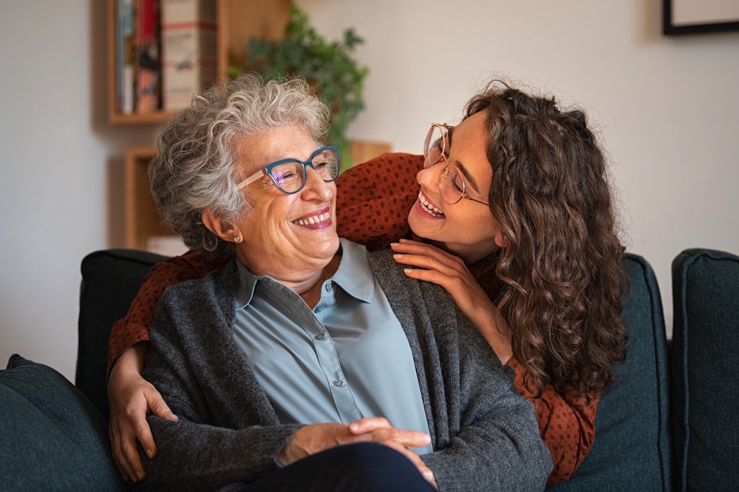 Grandmother and granddaughter laughing