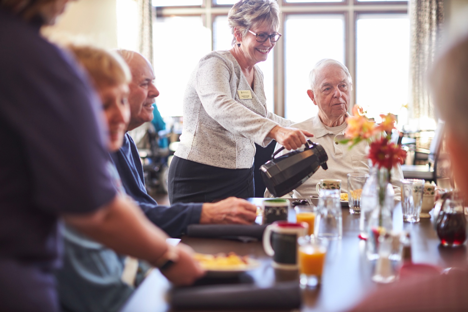 Senior friends having breakfast