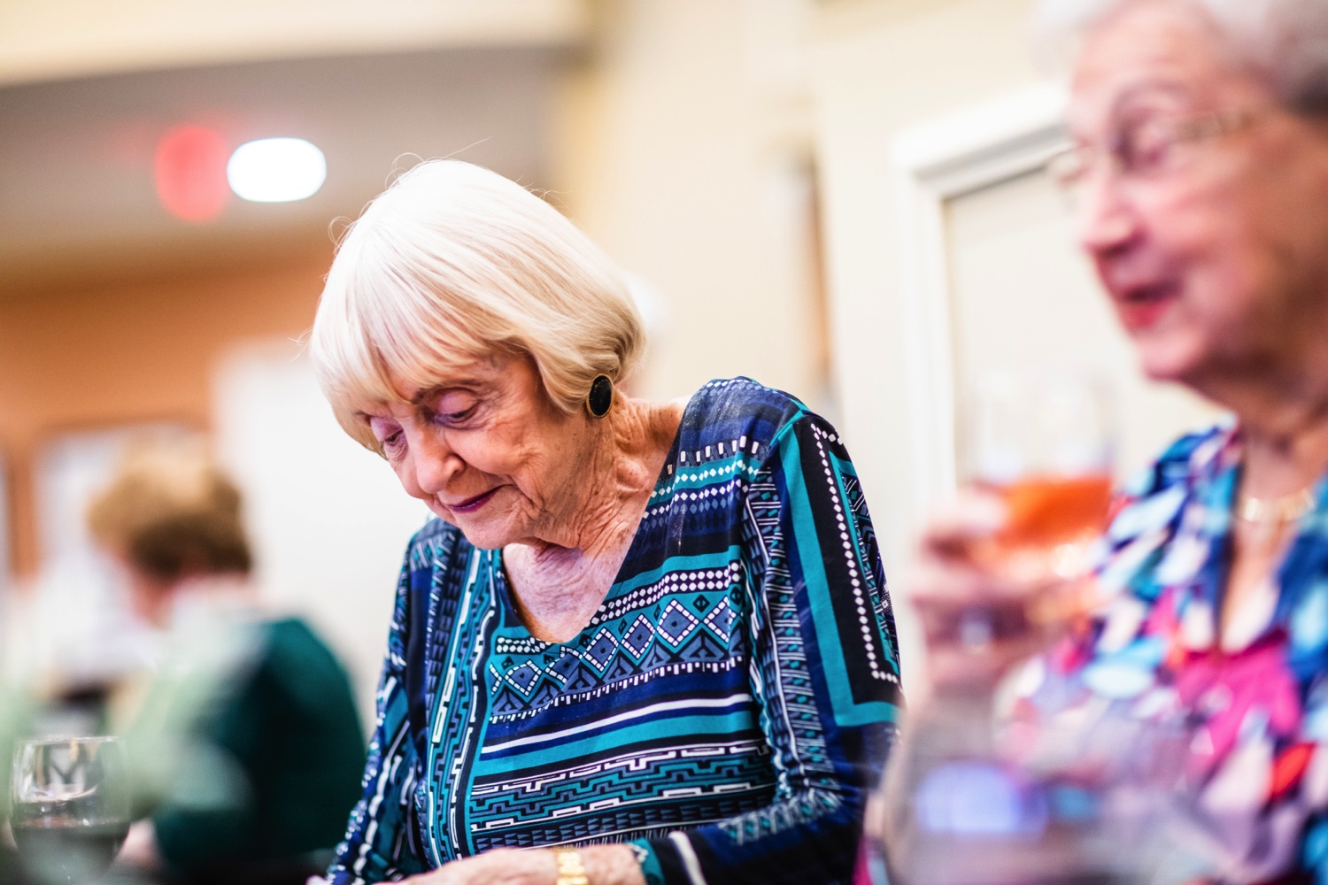 Senior woman with friends