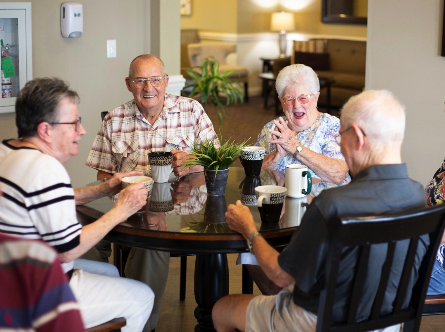 Group of Residents Smiling in dining room