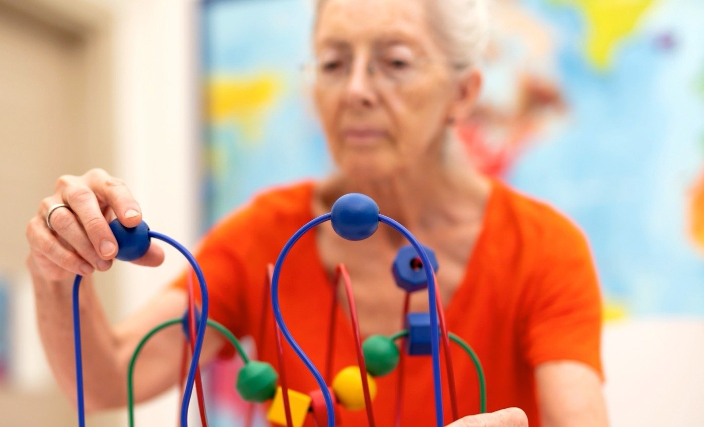 Senior woman with memory care exercise