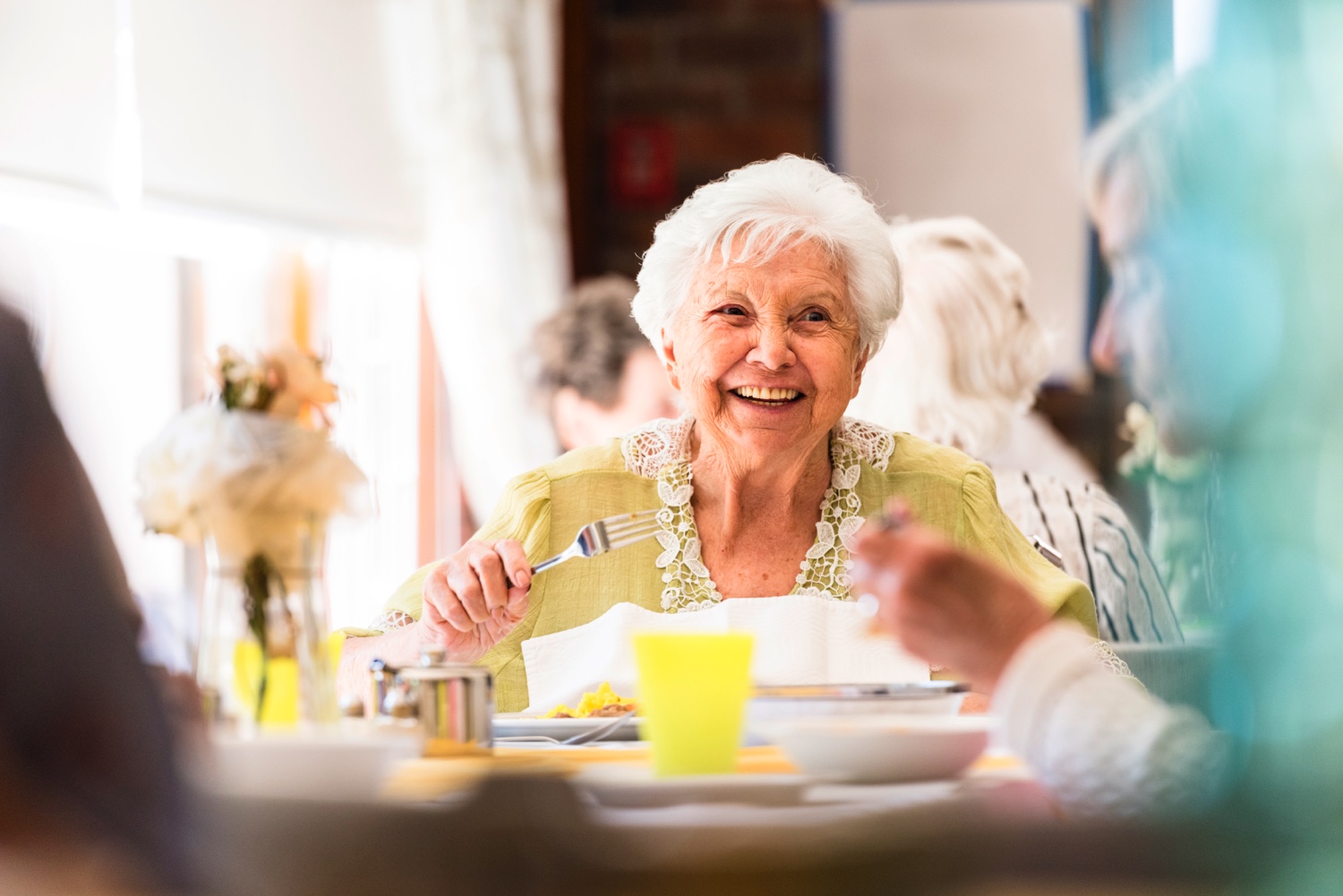 senior Woman Enjoying Meal