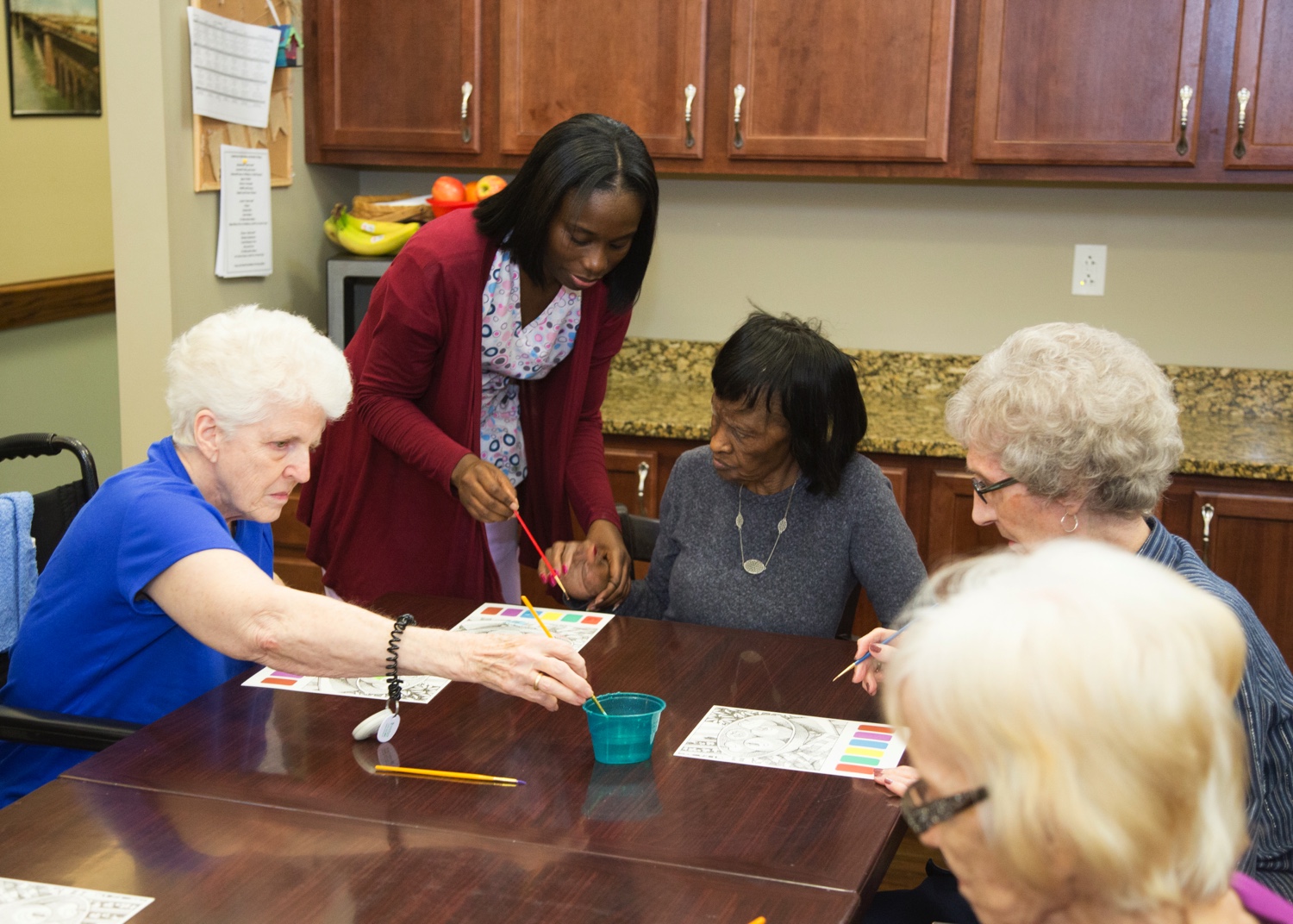 Group of seniors painting together