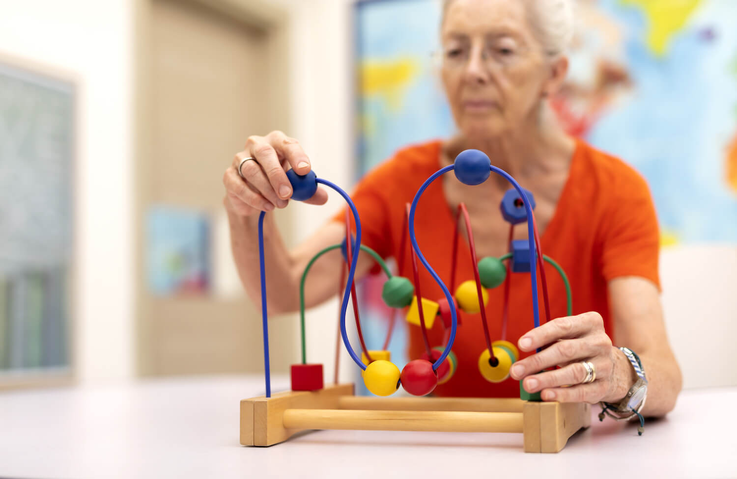 Woman enjoying bead maze