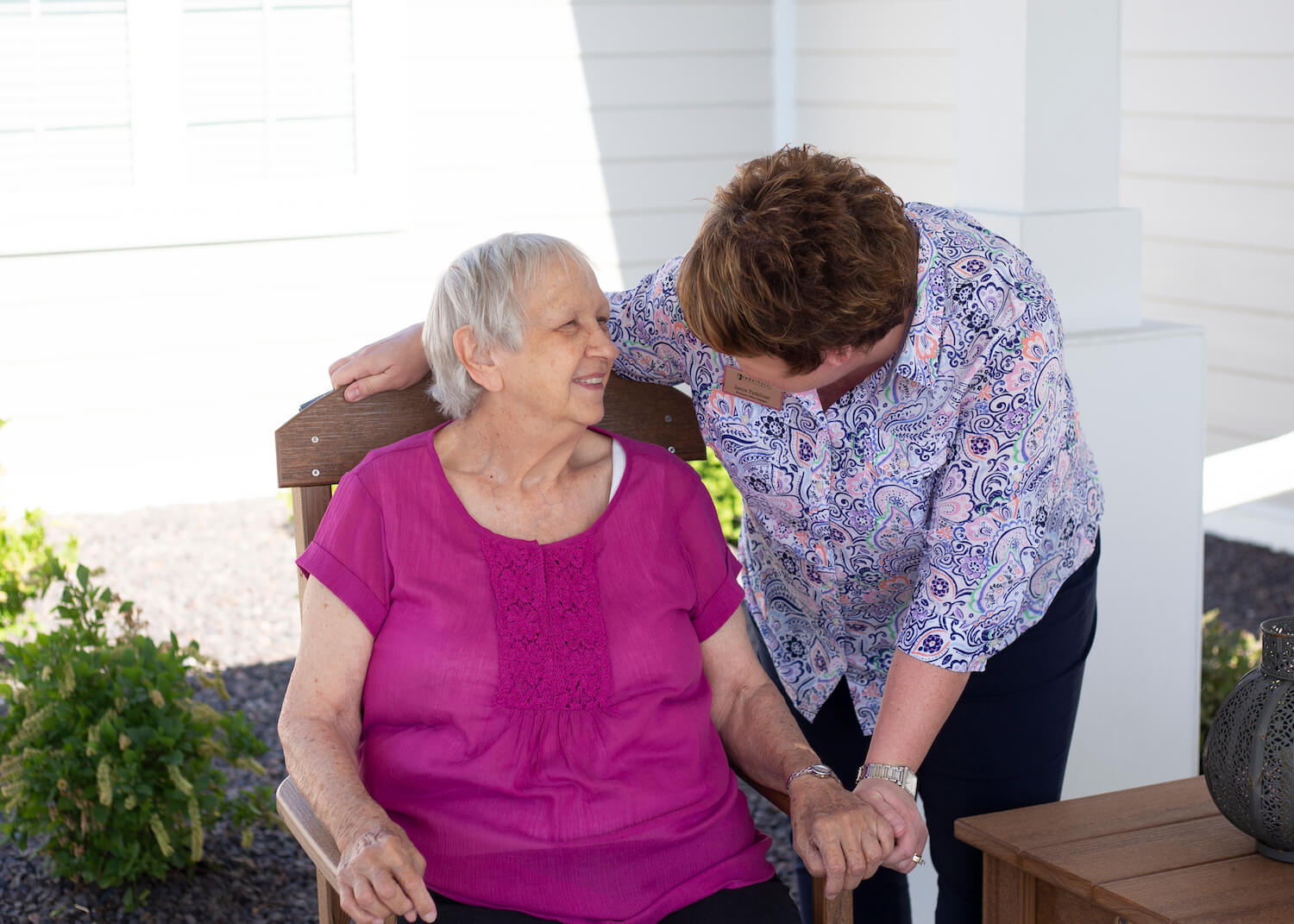 Caregiver giving attention to a resident