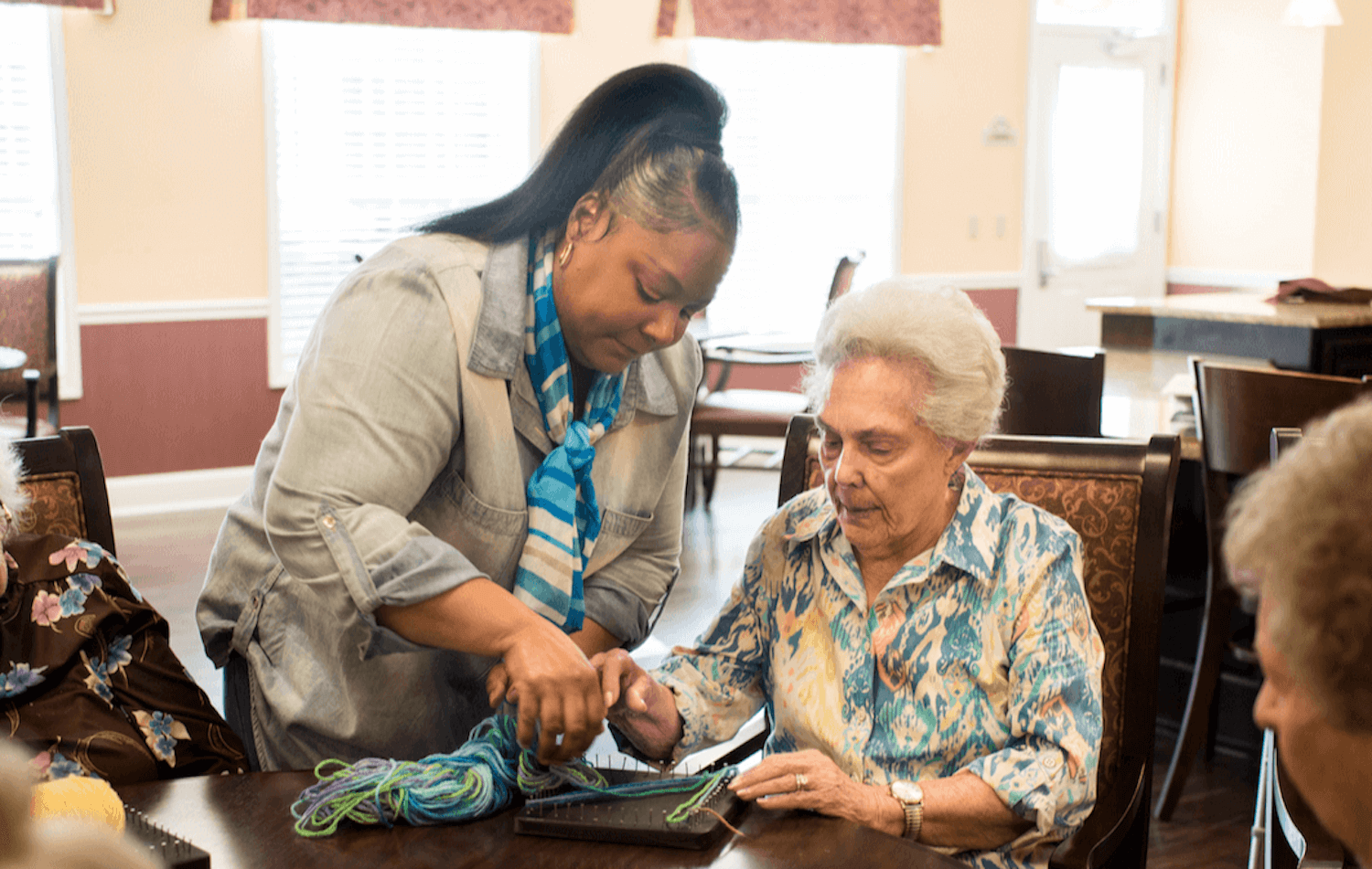 Woman Knitting With Staff