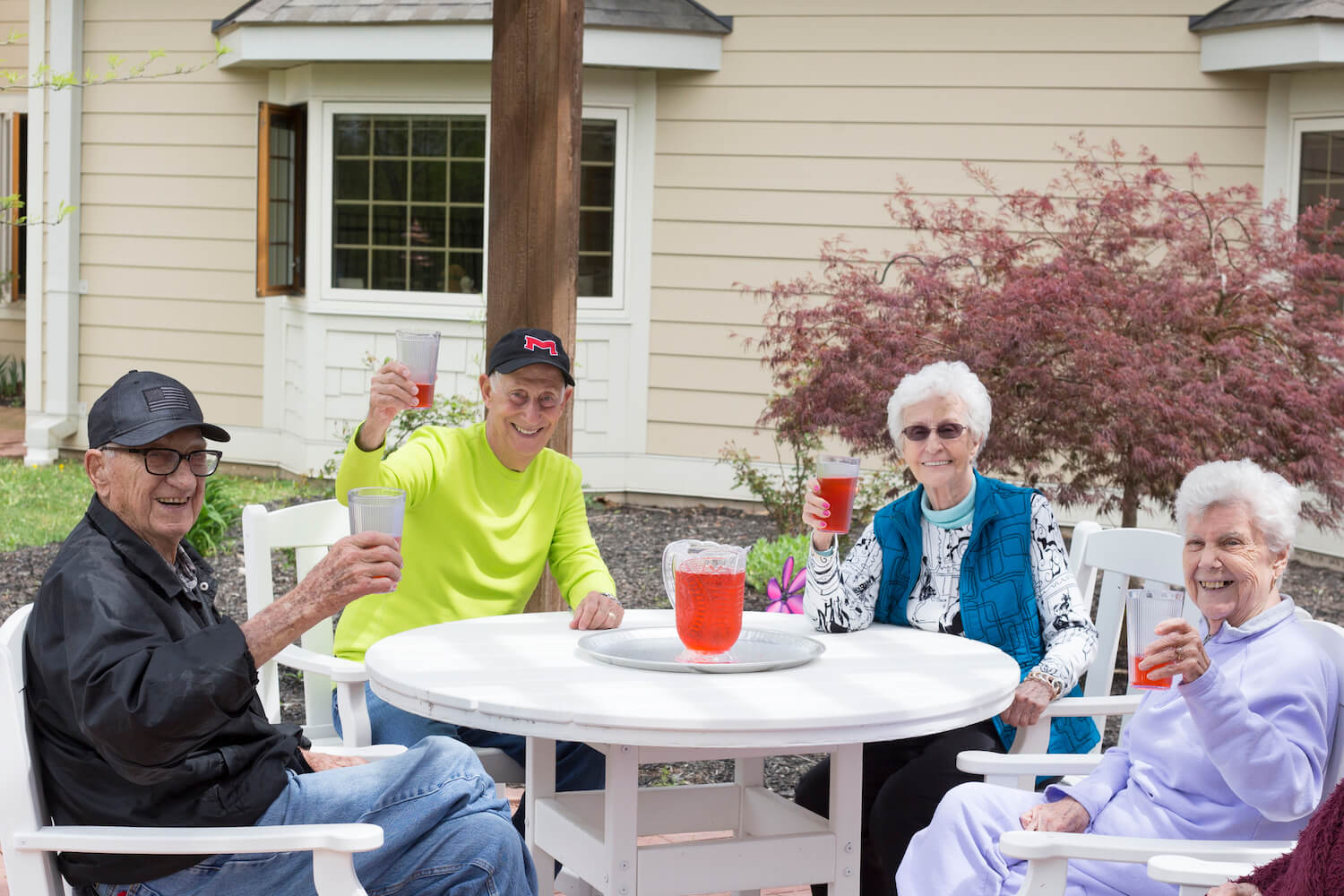 residents toasting drinks outdoors