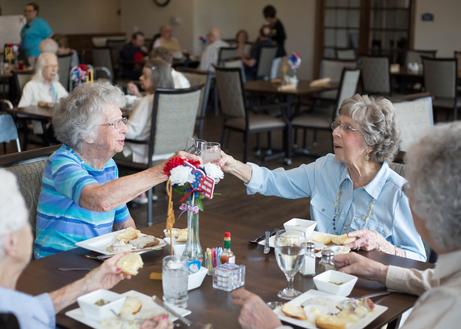 Residents toasting at lunch