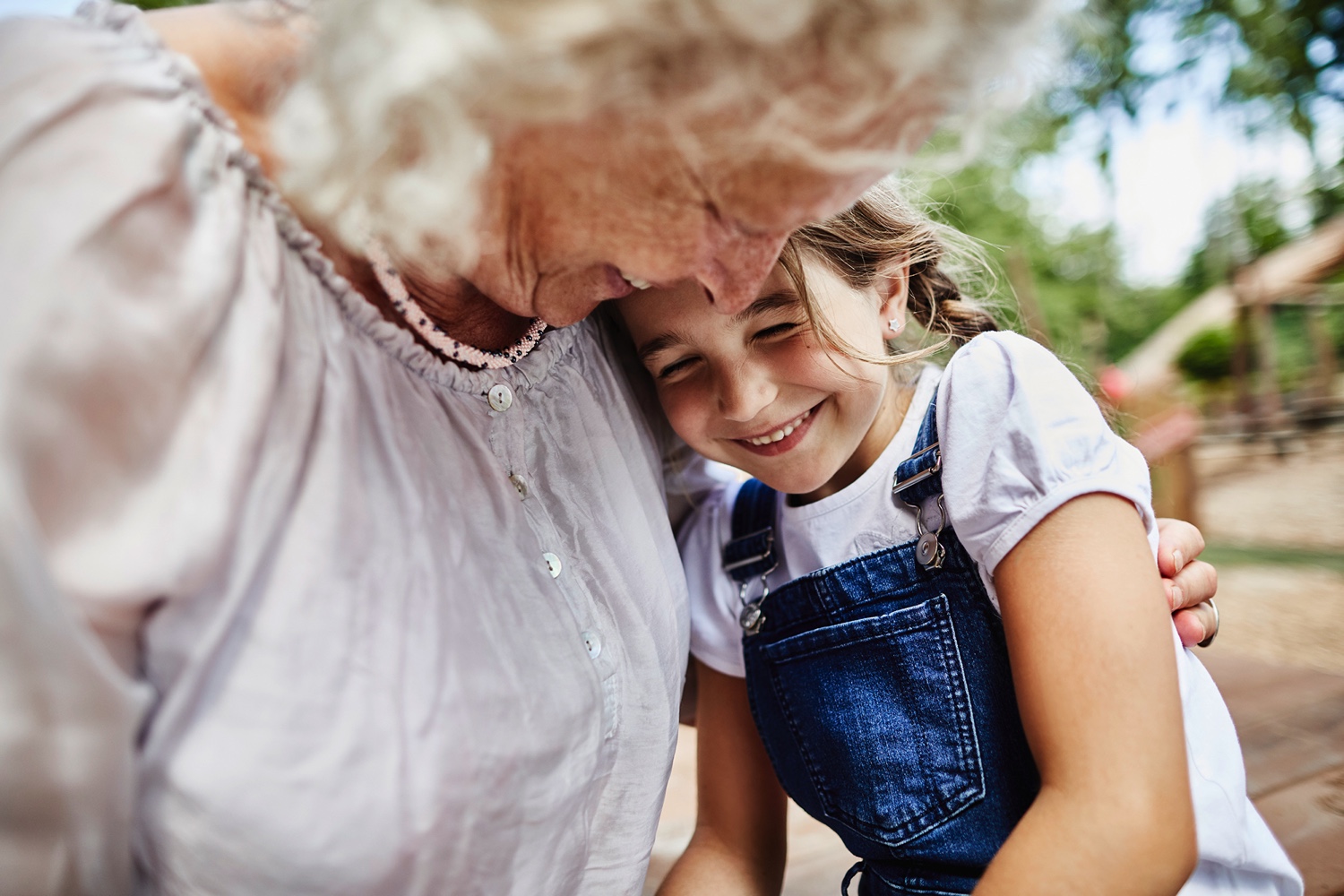 Grandmother Embracing Granddaughter