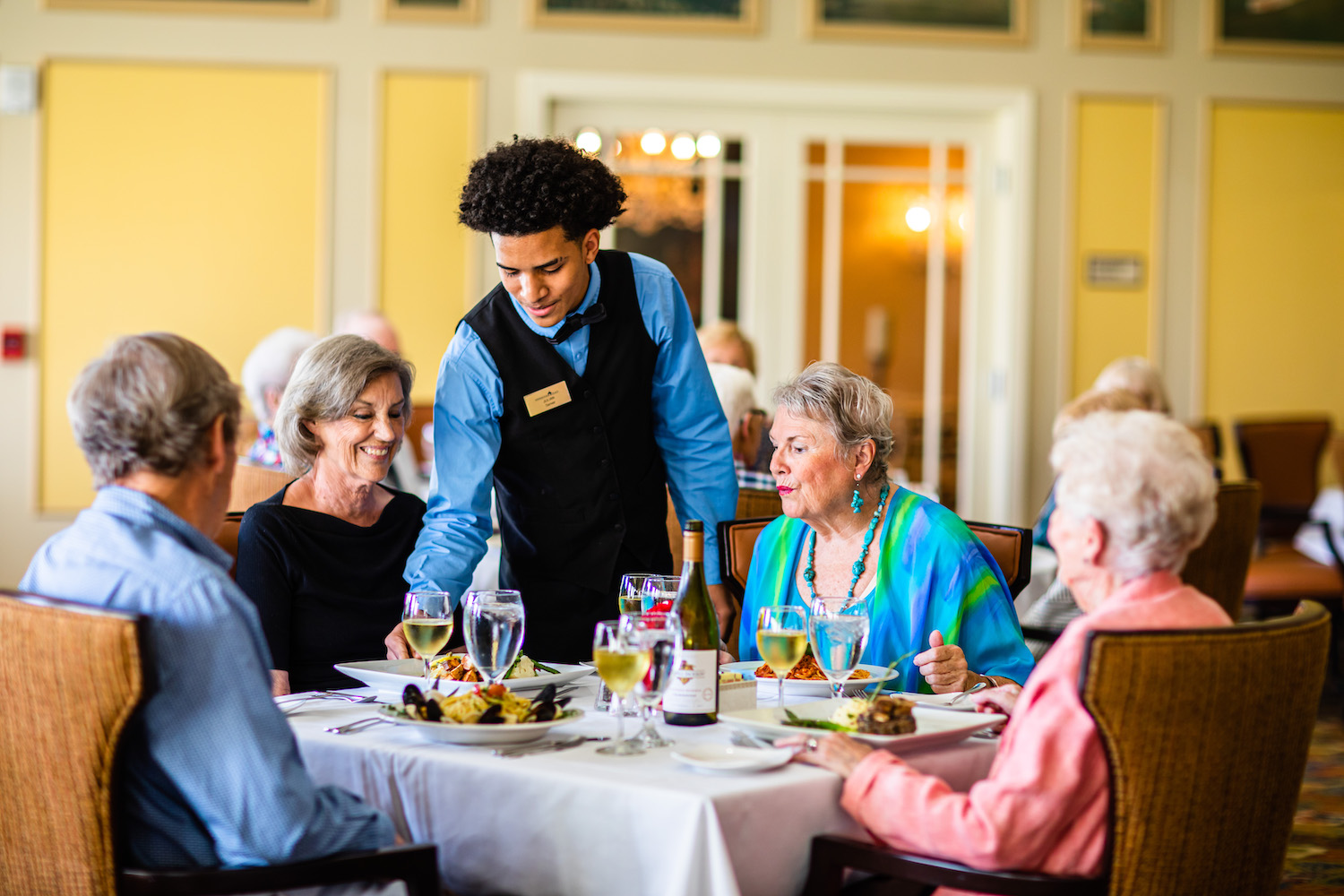 Seniors enjoying food at the restaurant