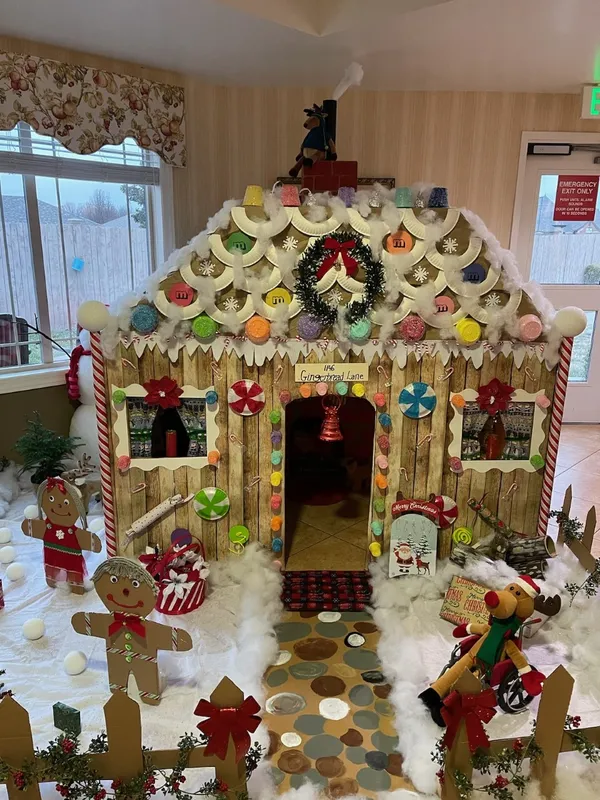 Featured Image for Springfield, MO | Springfield News Leader - Springfield senior community builds giant gingerbread house with tape, paint and smiles
