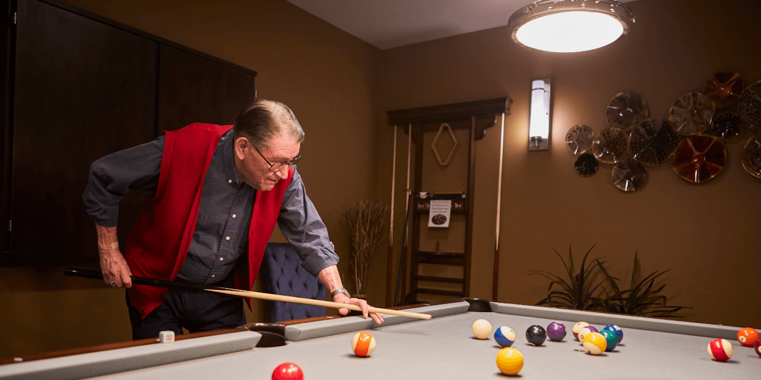 Resident playing pool