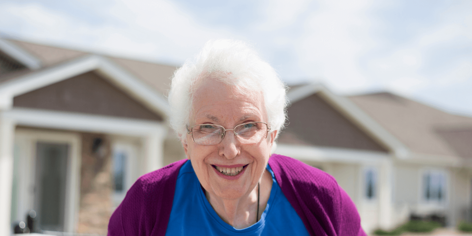 A smiling senior living resident